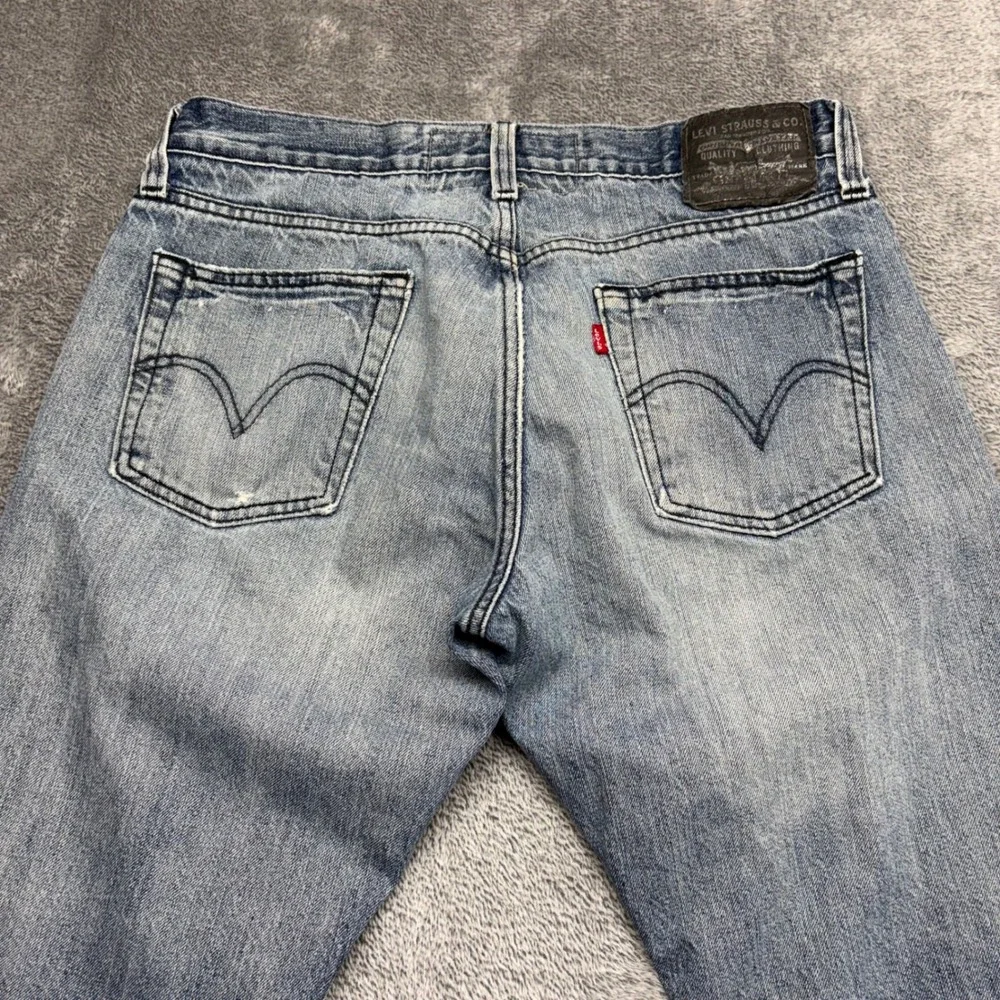 Levi's 514 Slim Straight Jeans Mens 34x30 Blue Good Light Wash Denim Zip Fly